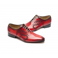 red patinated One cut oxford with a laser dragon