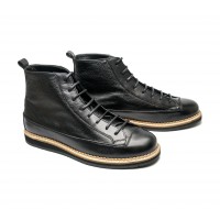 boot in emossed and smooth leather with flat rubber sole