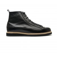 boot in emossed and smooth leather with flat rubber sole