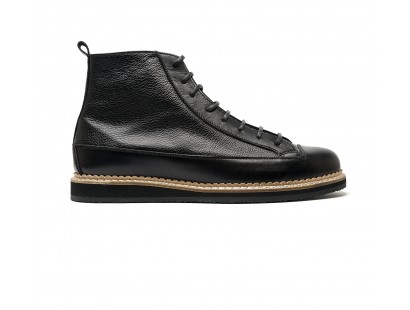 boot in emossed and smooth leather with flat rubber sole