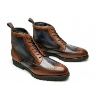 Brogue boot in patinated calfskin with commando sole